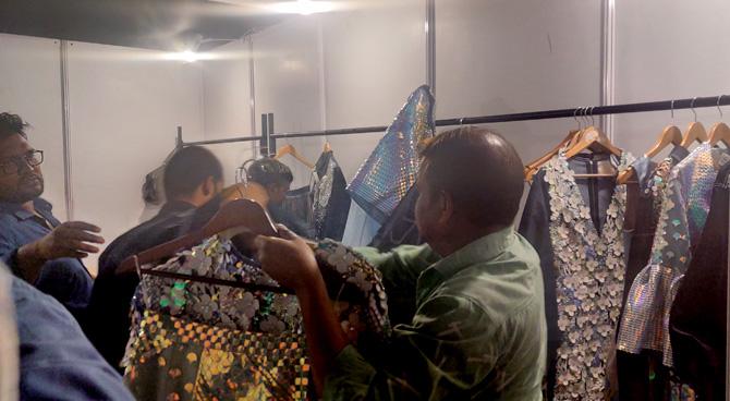 The Pankaj and Nidhi collection gets steamed before the show. Photograph: Kshamaya Daniel/Rediff.com.