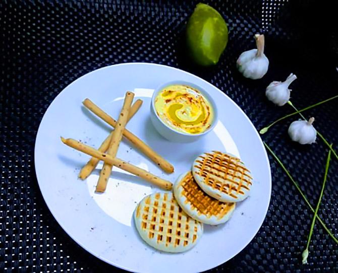 Mango Hummus with soup stick and grilled pita bread