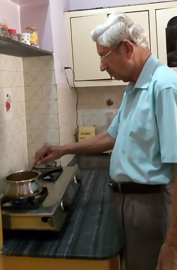 Vijai Sharma cooking at home