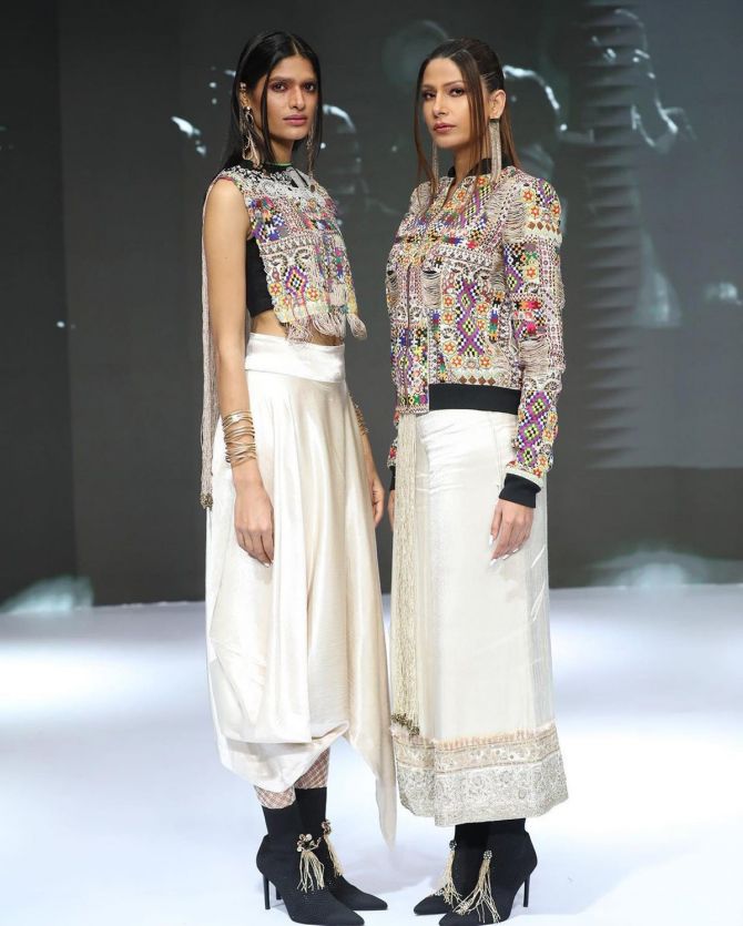 A model presents Anamika Khanna's collection at FDCIxLakme Fashion Week 2021