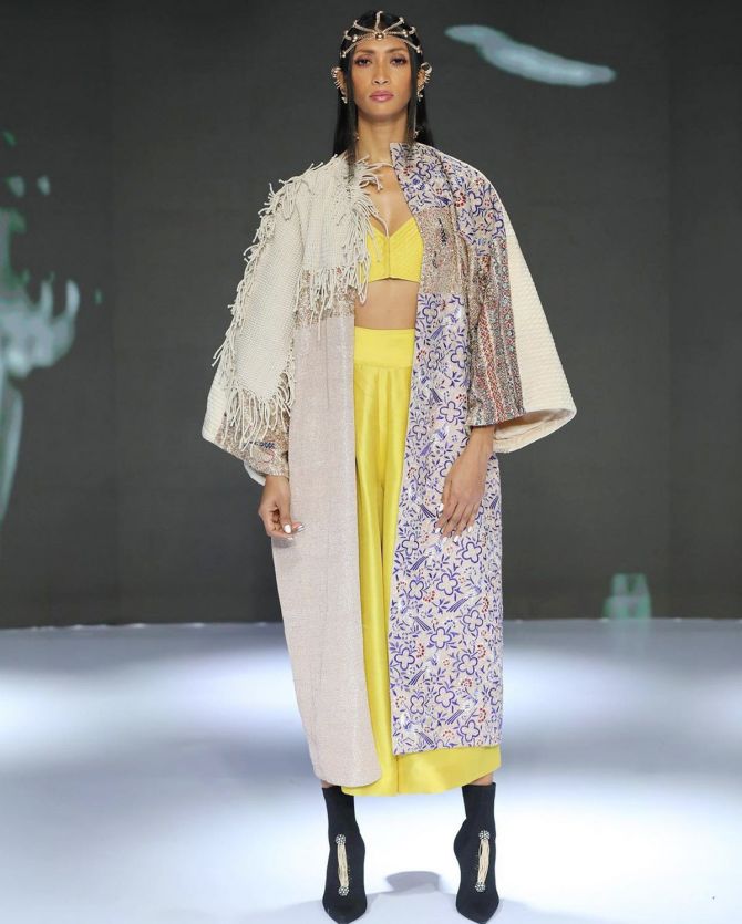 A model presents Anamika Khanna's collection at FDCIxLakme Fashion Week 2021