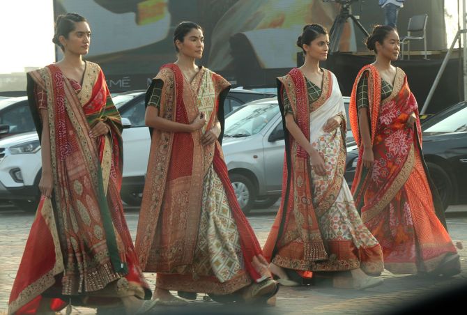 Models walk for Abhishek and Vinita at FDCI x Lakme Fashion Week