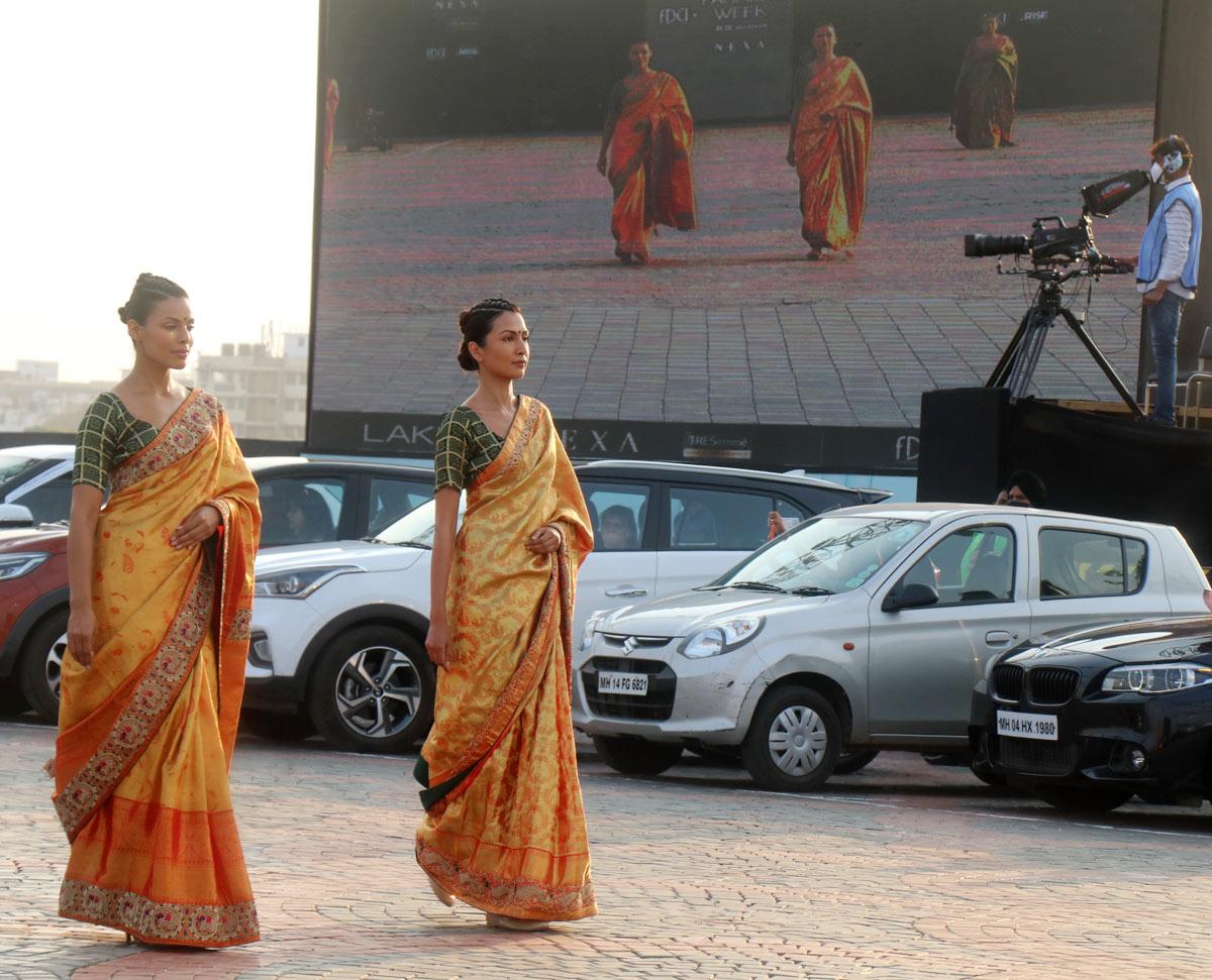 Models walk for Abhishek and Vinita at FDCI x Lakme Fashion Week