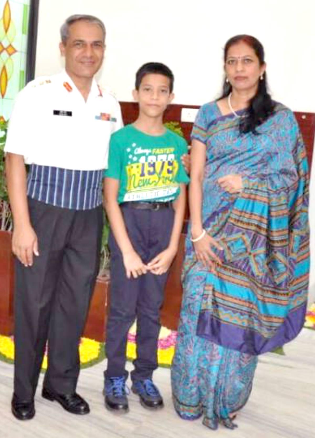 Sourav Roy, centre, with his father Colonel Sudip Roy