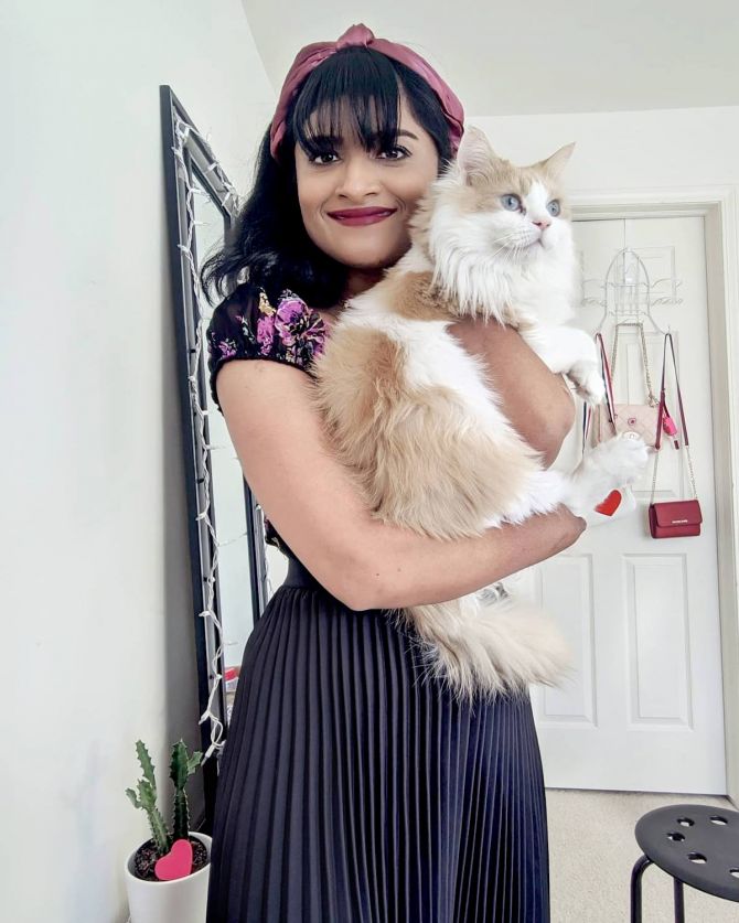 Malvika Iyer with her cat