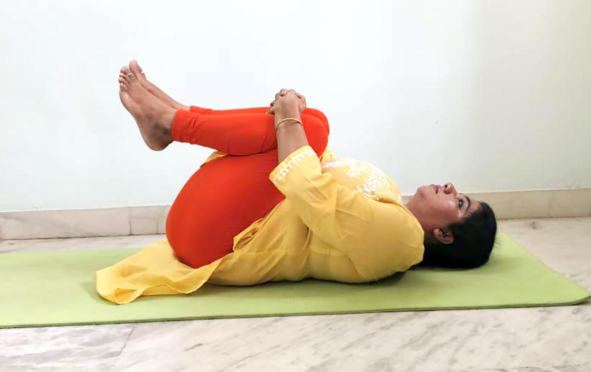 Pavanamukhtasana (Wind relieving pose)