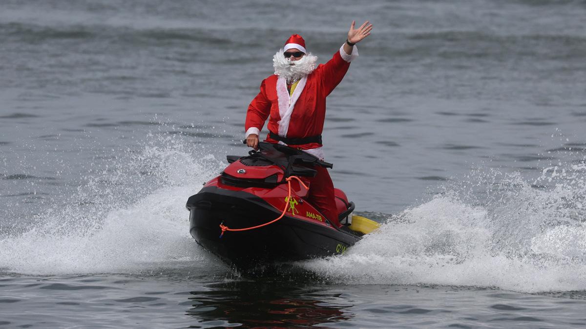 Santa Arrives On A Jet Ski Instead Of Sleigh - Rediff.com Get Ahead