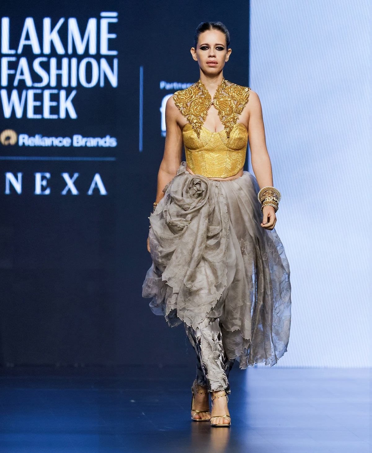 Kalki Sparkles In Gold