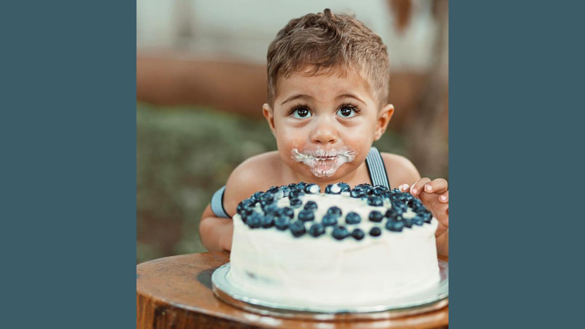 Child eating cake