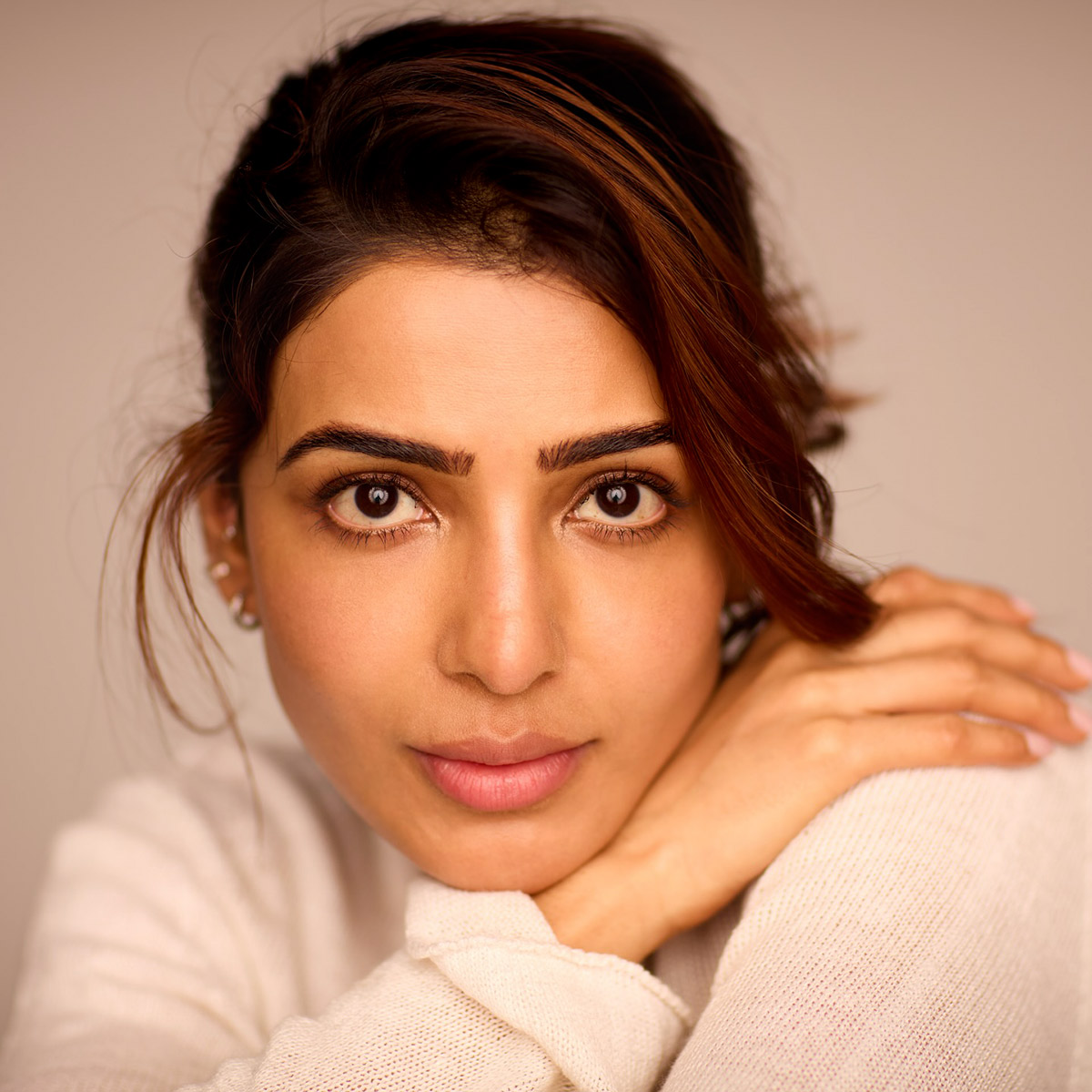 Samantha Ruth Prabhu in white top and ear piercings.