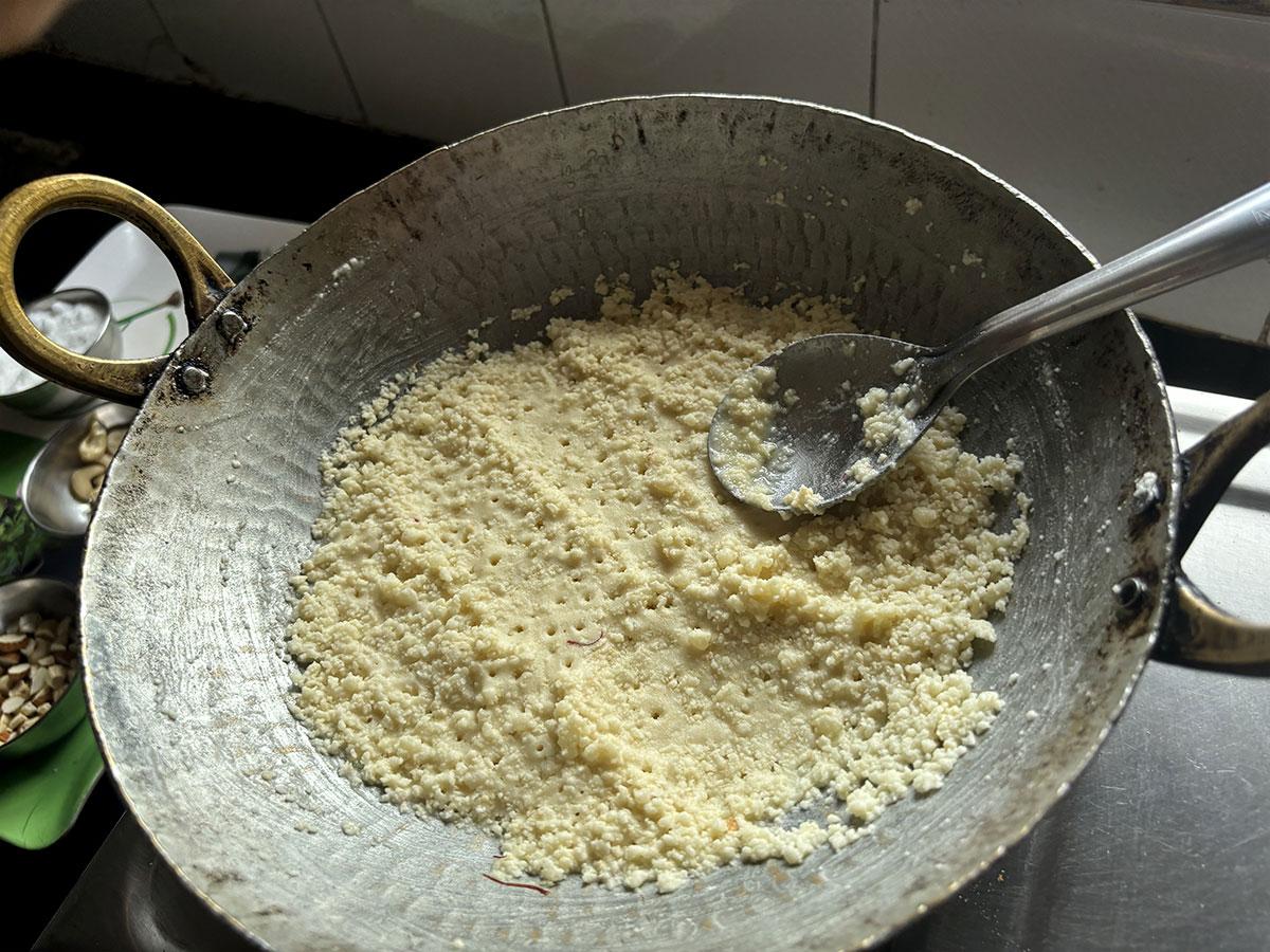 Roasting the rice for the laddoos