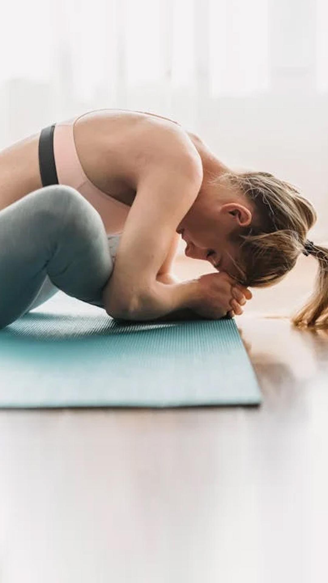 Supta Baddha Konasana (Reclined Butterfly Pose)