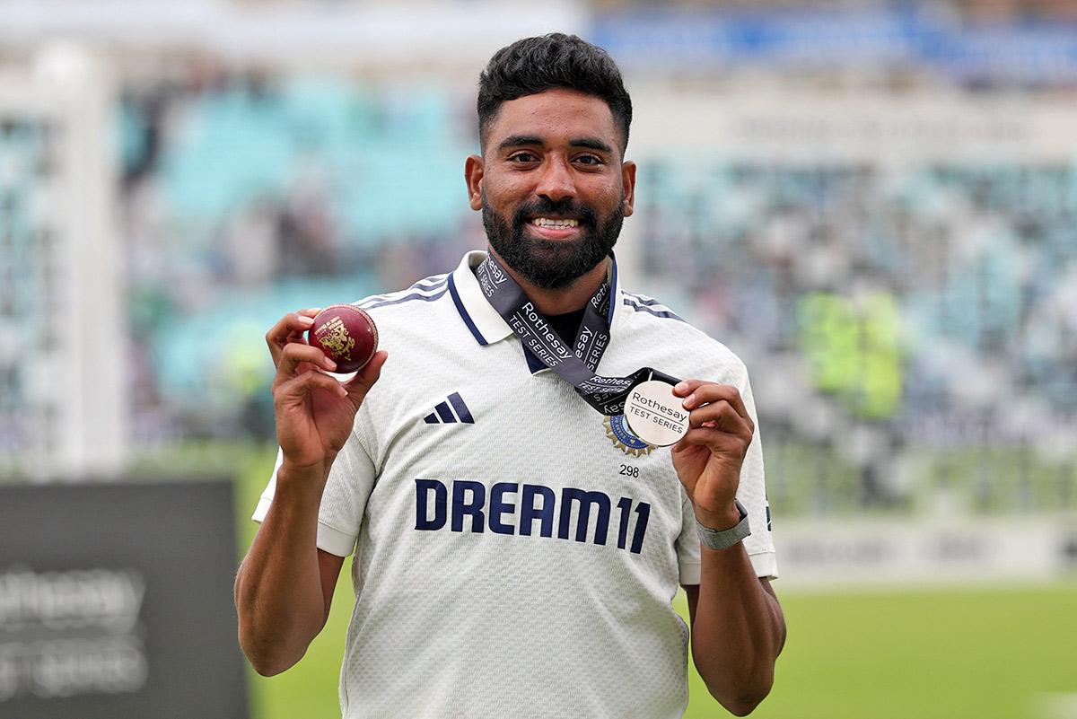 Mohammed Siraj poses after winning the player of the match award after India won the match to draw the test series 