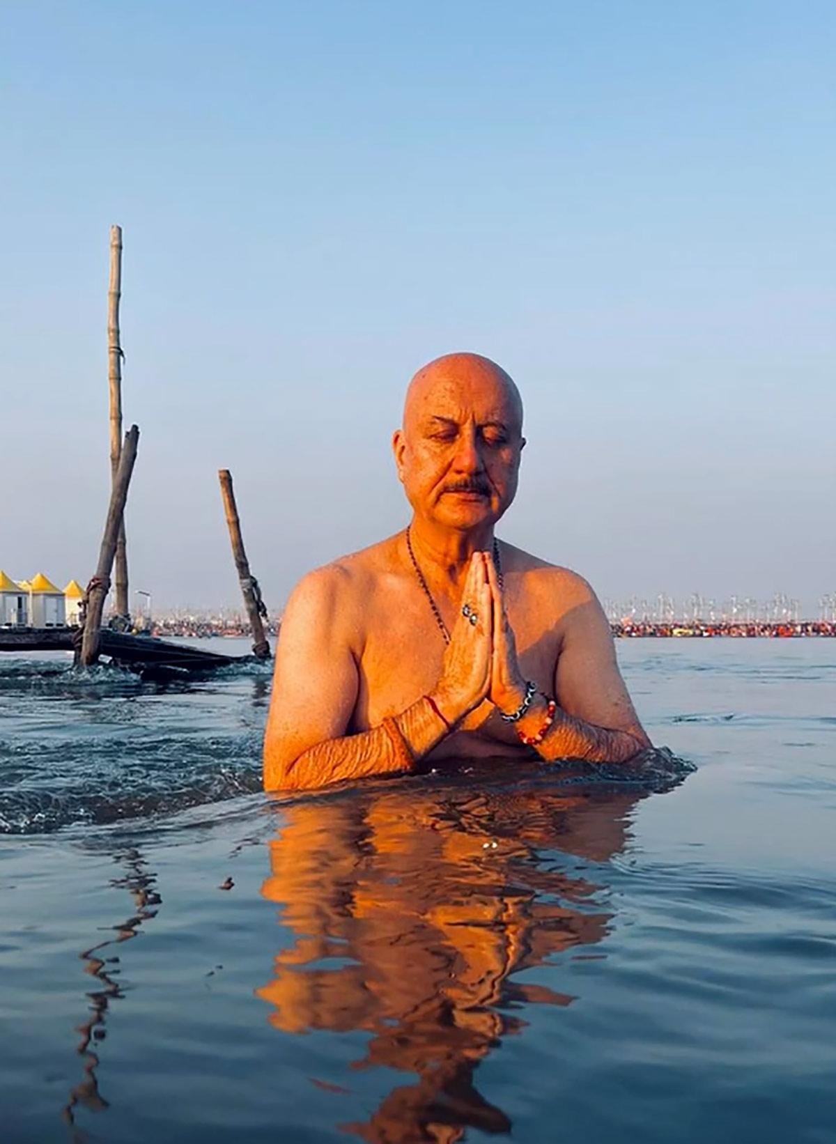 Anupam Kher takes a dip at the Triveni Sangam during Maha Kumbh 2025.