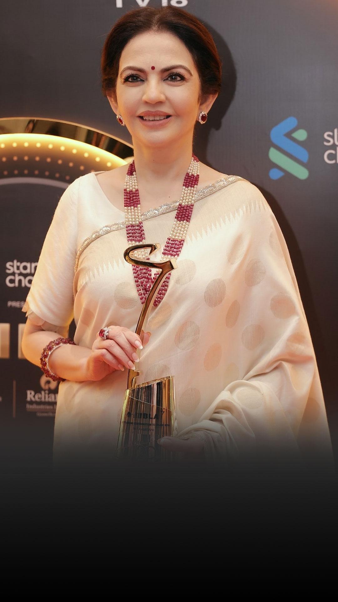 Nita Ambani is draped in a Kosa silk sari.