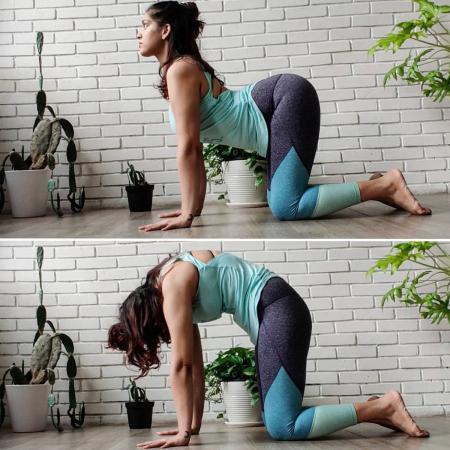 Marjaryasana Bitilasana aka Cat Cow Pose