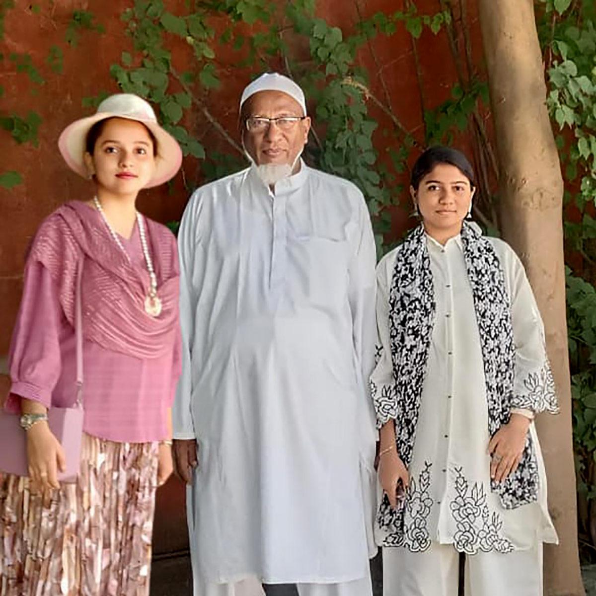 Riba and Rahin Hafezji with their grandfather