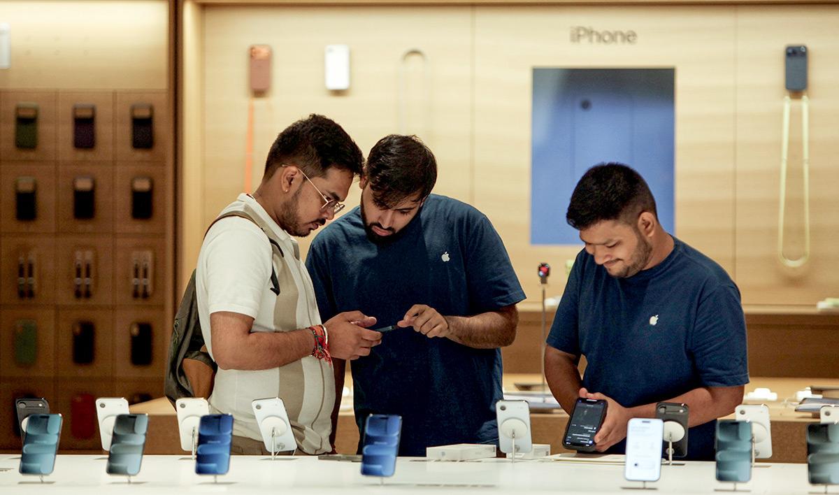 People check the newly launched iPhone 17 at the Apple Store