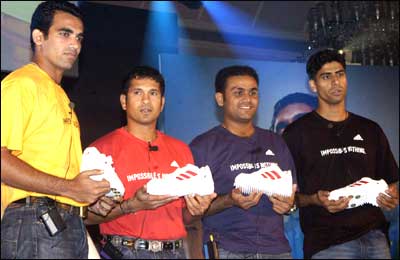 Indian cricketers Sachin Tendulkar, Virender Sehwag, Zaheer Khan and Ashish Nehra during the launch of Adidas's new sports shoes in Mumbai on Thursday. Photo: Deepak Salvi