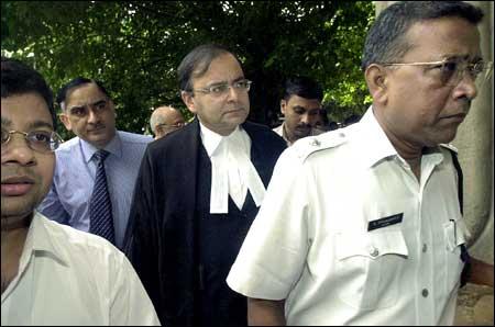 Former Indian law minister Arun Jaitley (C) escorted by India police arrives at Calcutta high court to appear for the Birlas  in Kolkata on Wednesday. The case involves the disputed last will and testament of Priyamvada Birla in which she left Rs 5,000 crore of the family's wealth to her chartered accountant, Rajendra S Lodha. Photo: Deshakalyan Chowdhury/AFP/Getty Images