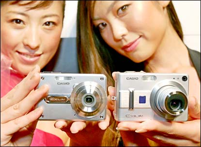 The world's smallest digital cameras with zoom lens 'Exilim EX-S100' (L) and the new 5 mega-pixel digital camera 'Exilim EX-Z55.' Photo: Yoshikazu Tsuno/AFP/Getty Images