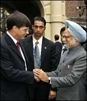 Dutch Prime Minister Jan-Peter Balkenende (L) greets Indian counterpart Manmohan Singh on Monday in The Hague. Photo: Ed Oudenaarden/AFP/Getty Images