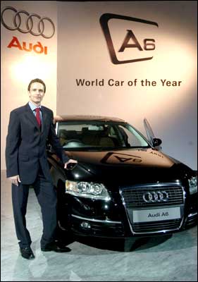 Michael Weber, Country Manager, India, Audi, posing with the A6 in Mumbai on Tuesday. Photograph: Indranil Mukherjee/AFP/Getty Images