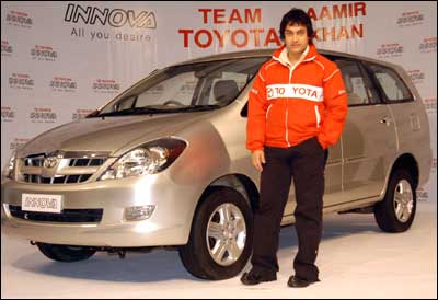 Toyota Kirloskar Motor on Wednesday signed leading Bollywood actor Aamir Khan as brand ambassador to promote its utility vehicle Innova in India. Photograph: Arun Patil