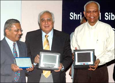 Minister for Science and Technology Kapil Sibal launching SofComp, a low budget computer designed to be deployed in rural setting in New Delhi on Tuesday. Also seen are Secretary CSIR Dr R A Mashalkar and Vinay Deshpande of SofComp Products. Photograph: Ranjan Basu/ Saab Pictures