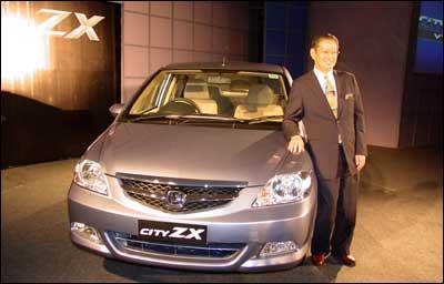 M Takedagawa, President and CEO of Honda Siel Cars, India, launching a new Honda City ZX version of the car in New Delhi on Thursday. Photograph: Dijeshwar Singh/ Saab Pictures