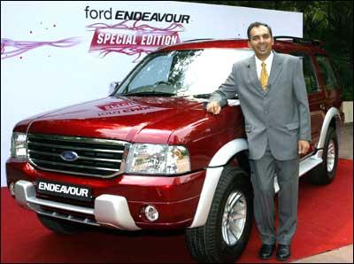 Sivaramakrishnan V, vice president (marketing and services), Ford India, stands in front of the Ford Endeavour Special Edition SUV during its launch in New Delhi on Friday. It costs Rs 15,39,000. Photograph: Raveendran/AFP/Getty Images