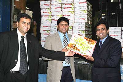 The first batch of 150 boxes of choicest Alphonso and Kesari mangoes in 18 years arrived in New York and was rica received by Bhaskar Savani, Arum and Niranjan Savani of Savani Farms, an importer and distributor of the fruit, at the JFK Airport. Photograph: Mohammed Jaffer/SnapsIndia