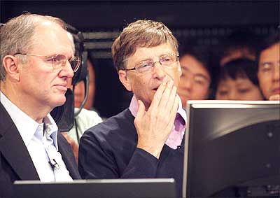 Microsoft executives Bill Gates (R) and Craig Mundie (L) view software projects during Microsoft's Imagine Cup competition at the company's headquarters June 26, 2007 in Redmond, Washington. Photograph: Dan Levine/AFP/Getty Images