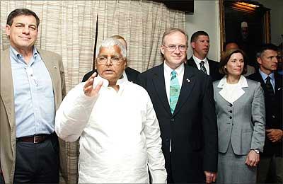 Railway Minister Lalu Prasad with David Blair (right), Professor of Economics in the U.S. National Defence University, and other officials during a meeting at Rail Bhavan in New Delhi on Tuesday. Photograph: Manan Vatsyayana/AFP/Getty Images