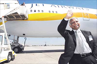 Naresh Goyal in front of the new-look Jet