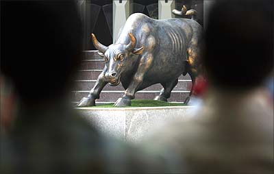 A bronze sculpture of a bull is seen on the premises of the Bombay Stock Exchange.