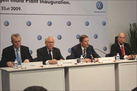 Volkswagen oficials addressing a press conference during the launch of the Pune plant.