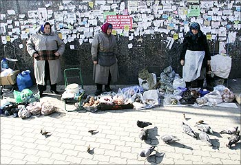 Women sell vegetables in a street in central Kiev.