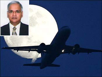 An Air India aircraft takes off. (Inset) AI chairman Arvind Jadhav.