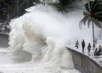 Giant waves lash Mumbai as a cyclonic storm hovered in the Arabian Sea.