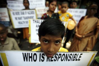 A child participates in an awareness campaign on climate change.