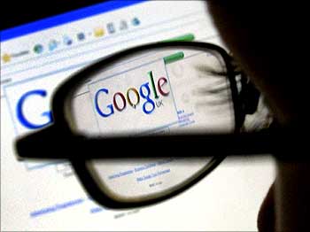 A Google search page is seen through the spectacles of a computer user in Leicester.