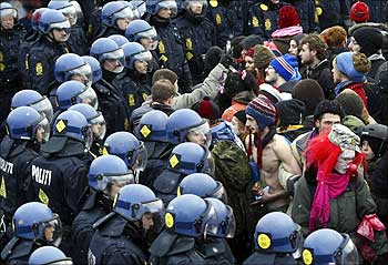 Police surround protesters outside the venue of the United Nations Climate Change Conference 2009 in Copenhagen.