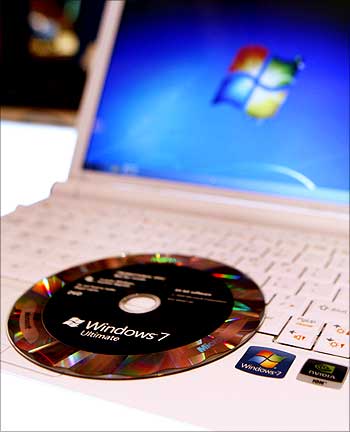 The new Windows 7 operating system installation DVD is pictured on a notebook.