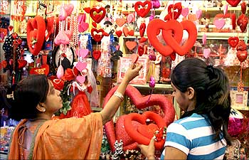 Customers look for gifts ahead of Valentine's Day celebrations in shop in Ahmedabad.