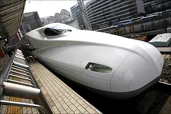 Japan Railway's new N700 bullet train stands at a platform of Tokyo Station in Tokyo.