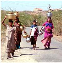 Women carry water