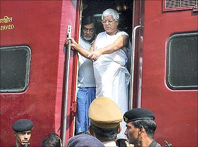 Railway Minister Lalu Prasad Yadav in conversation with Railway officials.