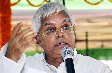 Lalu Prasad Yadav speaks during a meeting with his party workers in Patna.