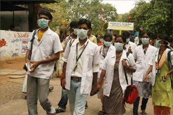 People, including the visitors, at the Government Chest Hospital at Erragadda Hyderabad, where several swine flu patients, including seven IT professionals have been admitted.